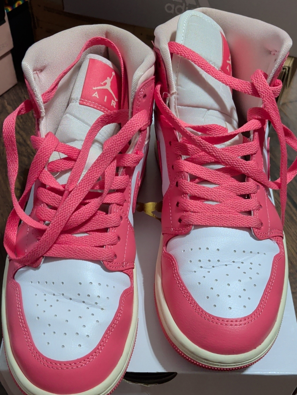 Jordan Women's Pink and White High-Top Sneakers with Bold Laces